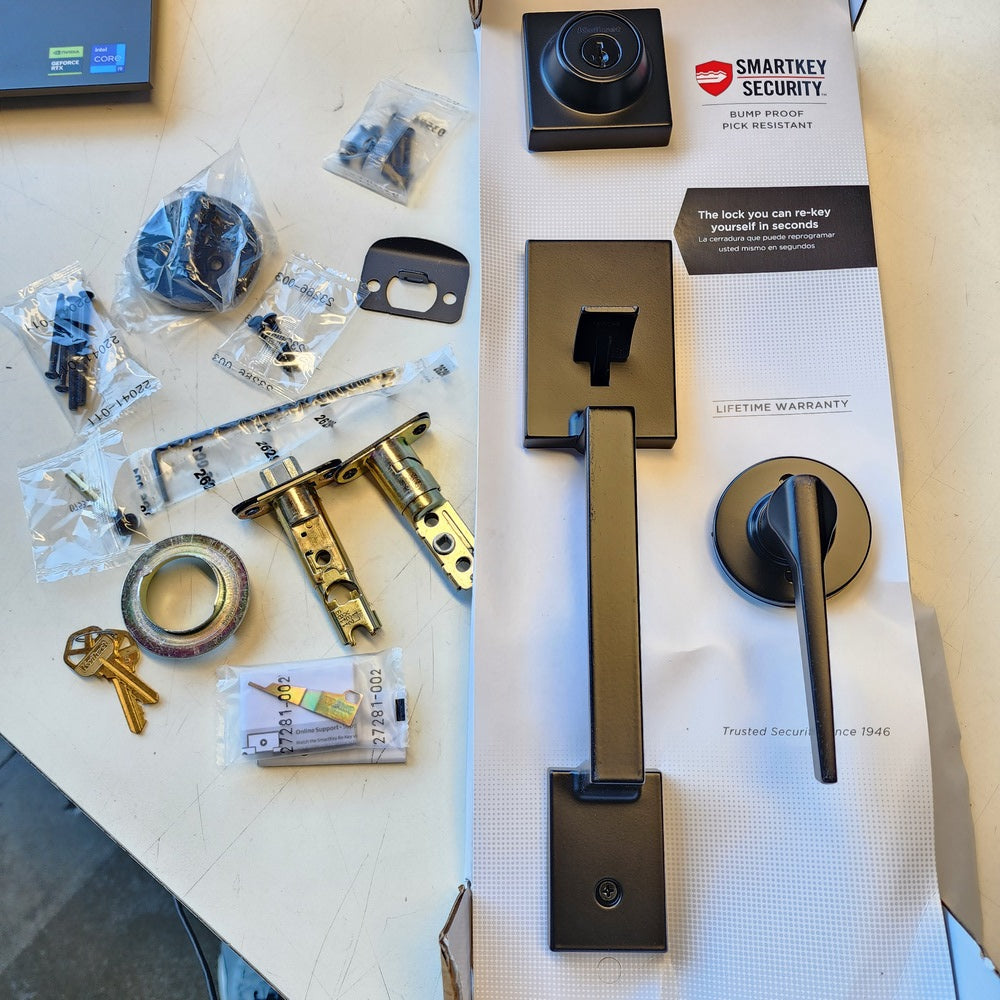 Amador Matte Black Entry Door Handleset with Round Rose Hollis Lever Featuring SmartKey Security (96870-165) Amador Matte Black Entry Door Handleset with Round Rose Hollis Lever Featuring SmartKey Security (96870-165)